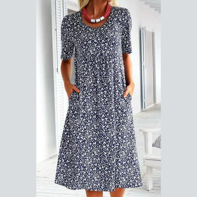 Amara | Stilfuld Blomsterprint Midi Kjole