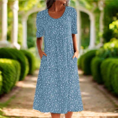 Amara | Stilfuld Blomsterprint Midi Kjole