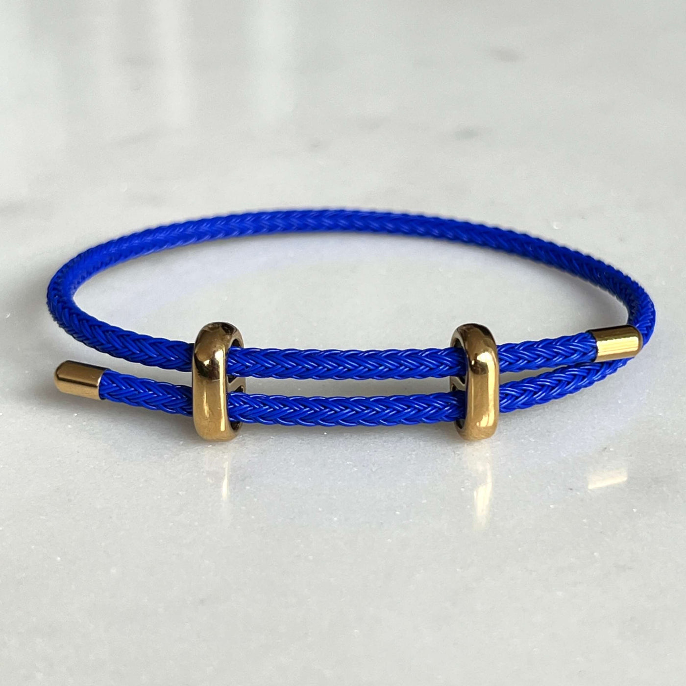 Vævet stålreb armbånd guld blå